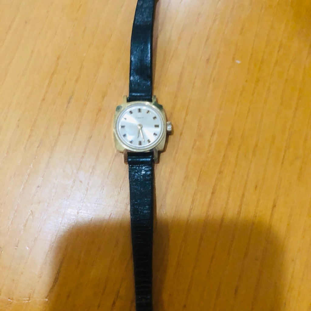 Gold Case Watch With Black Strap